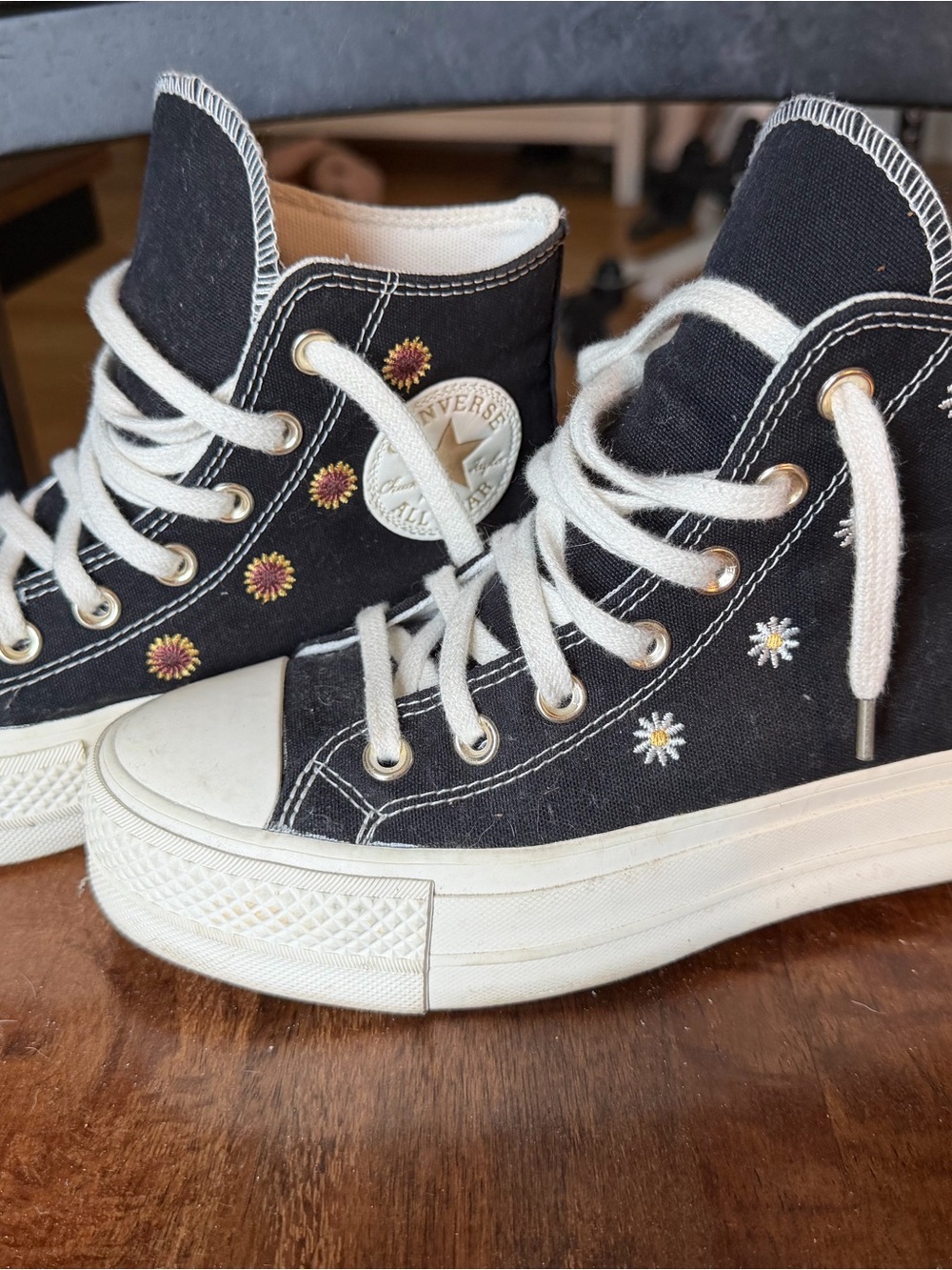 Converse Women's Black High-Top Sneakers with White Laces and Daisy Embroidery